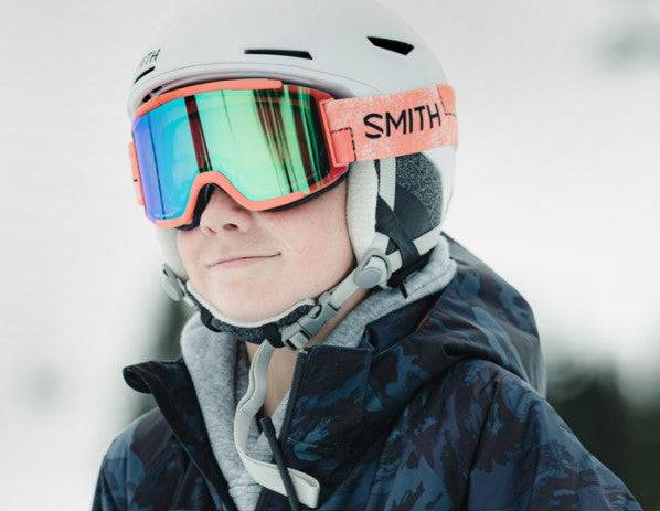 Person wearing Smith Squad ski goggles