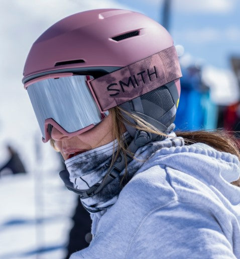Woman wearing Smith squad XL ski goggles