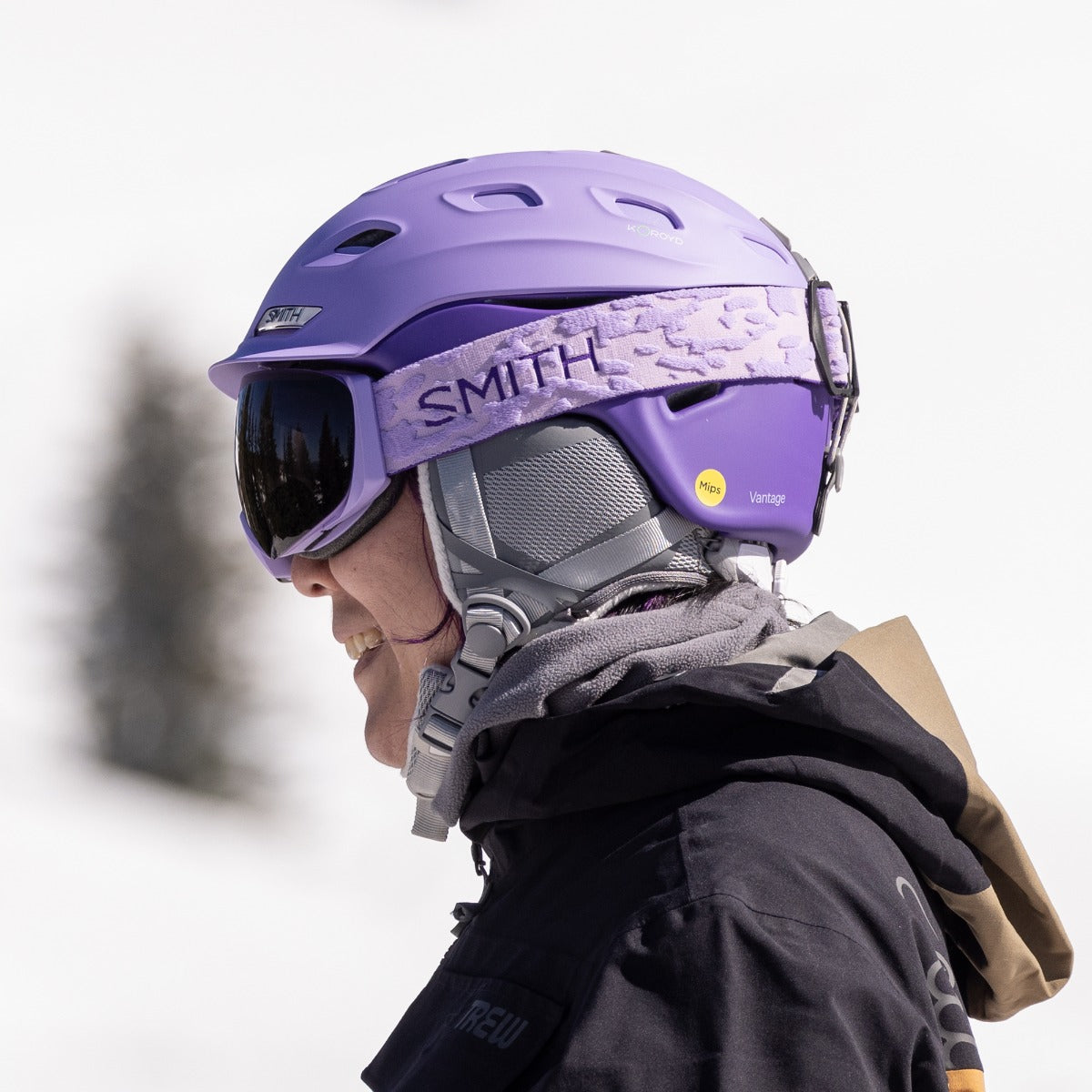 Woman wearing Smith I/O Mag ski goggles