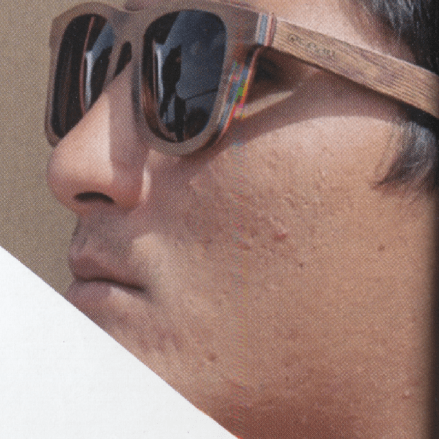 Guy wearing Ocean Venice Beach wood sunglasses