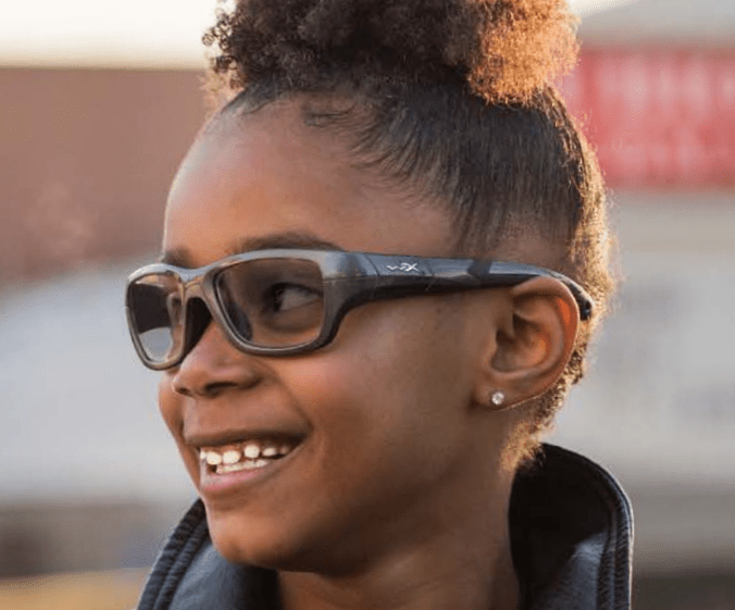 Kid wearing Wiley-WX Flash Sports glasses